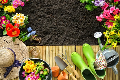 Seasonal planting and border care in a Motspur Park garden